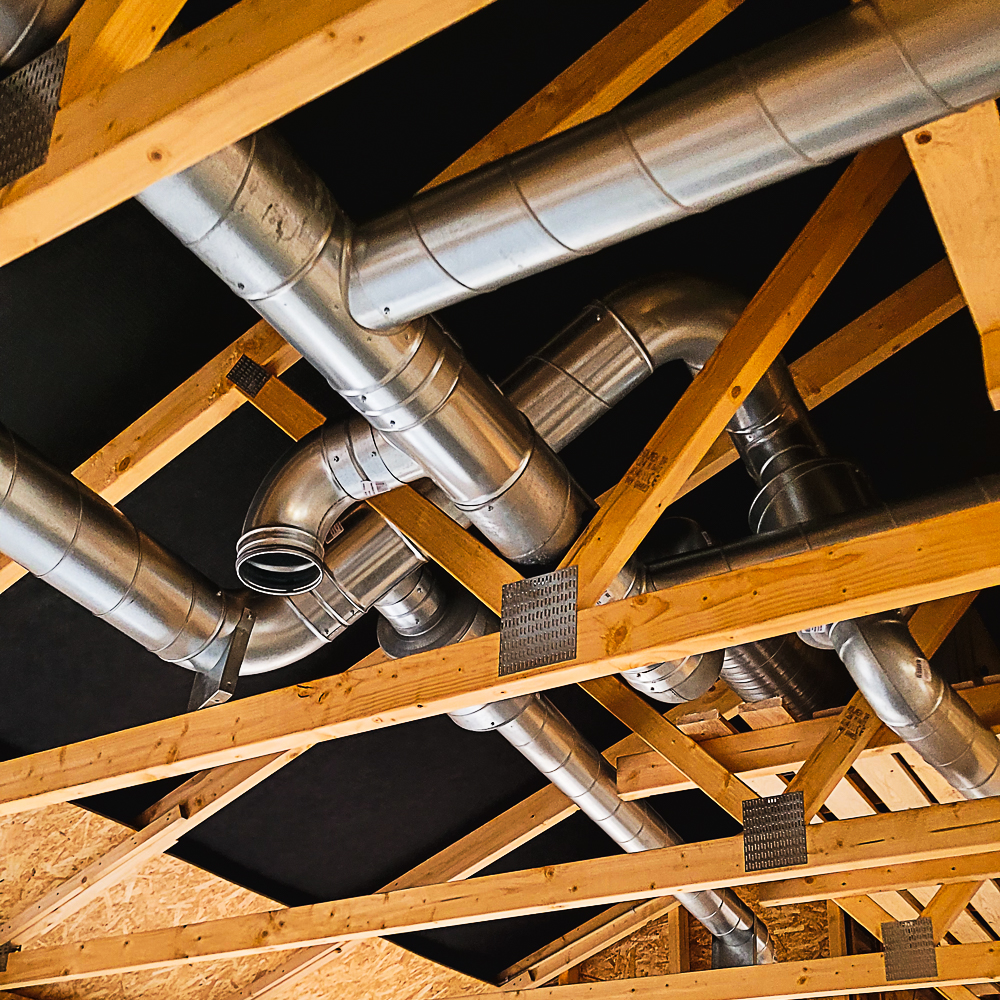 Pipe routing between rafters